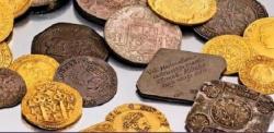 Где и когда появились первые монеты с изображением